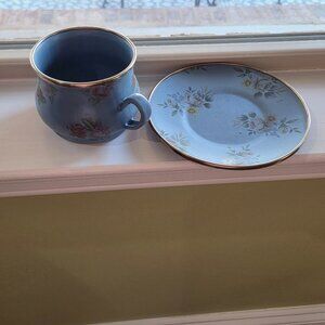 MacKenzie-Child's Ltd. bronzed trim enamel-ware/1 teacup and 1 saucer set